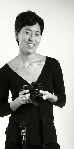 Melinda Duritsa smiling and holding her camera